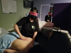 Night Class Student Massage Therapist Blindfold exercise