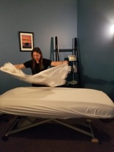 Toms River Day Class setting up massage treatment rooms